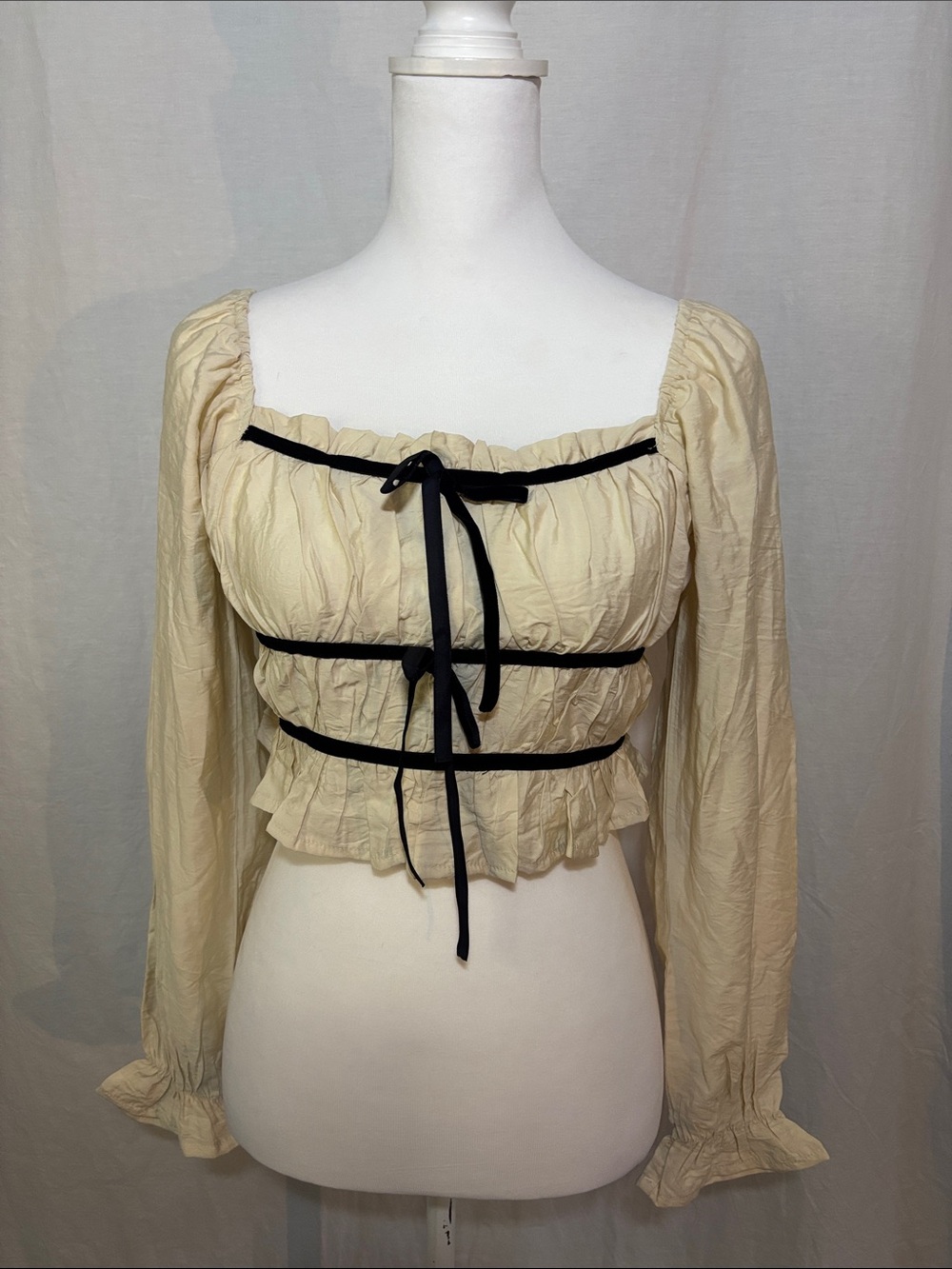 Cream Long-Sleeve Whimsigoth Renaissance Crop Top with Black Velvet Tie Accents
